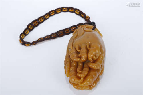 A Field Yellow Stone Buddha's Hand Pendant.