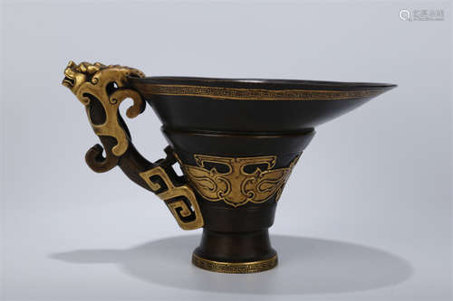 A Copper Cup with Dragon Shaped Handle.