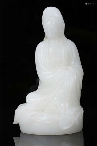 A Glassware Sitting Avalokitesvara Statue.