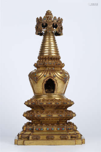 A Gilt Copper Buddhist Stupa.
