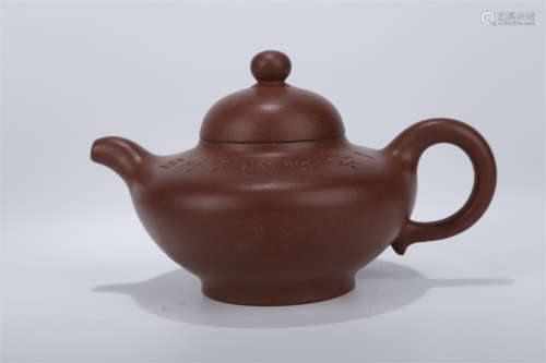 A Purple Clay Teapot with Poems Design.