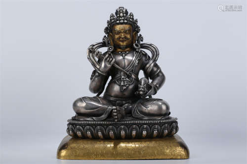 A Silver Vaisravana Buddha Statue.