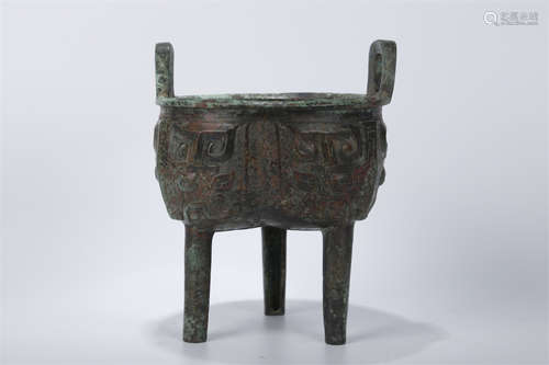 A Bronze Tripod Caldron.