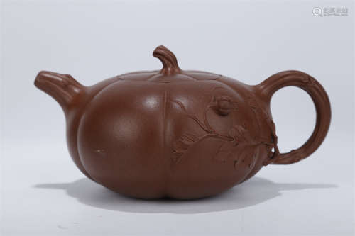 A Ridged Melon Shaped Purple Clay Teapot.