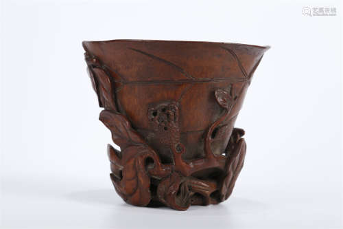 A Bamboo Horn Cup with Buddha's Hand Design.