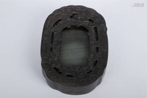 A Songhua Inkstone with Flowers Design.