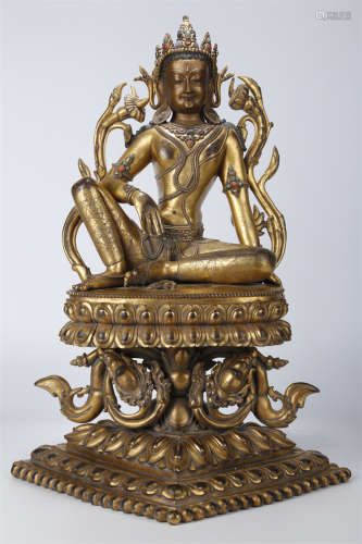 A Gilt Copper Avalokitesvara Statue.