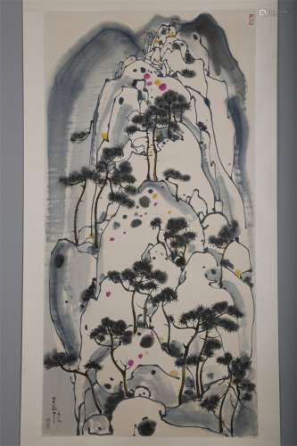 A Pine and Rock Painting by Wu Guanzhong.