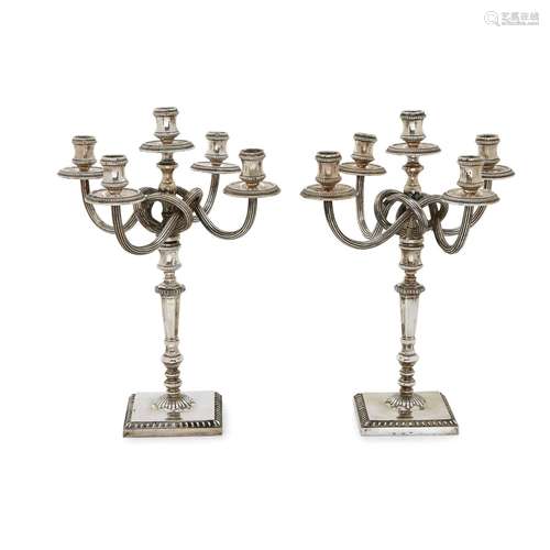 Two silver candelabra