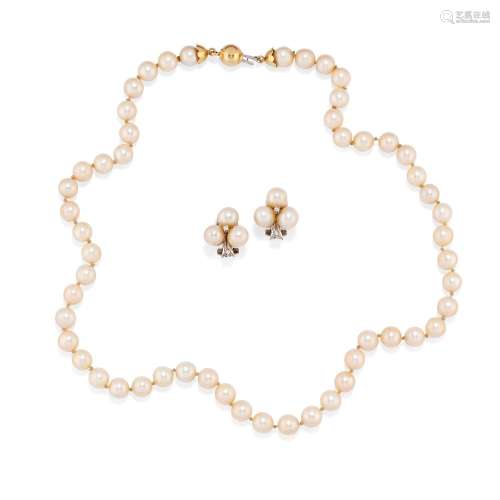 A 18K two color gold, cultured pearl and diamond necklace an...