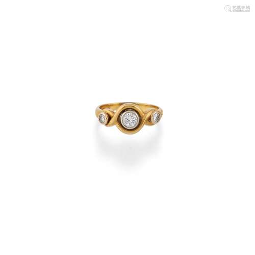 A 18K two color gold and diamond ring