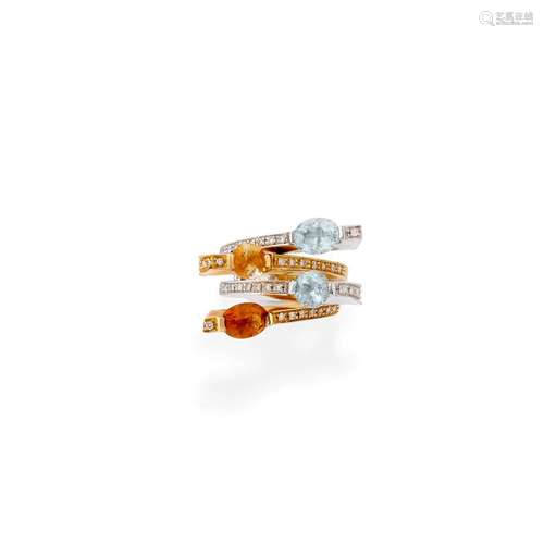 A 18K two-color gold, quartz and topaz ring