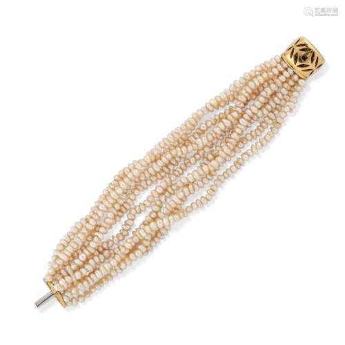 A 18K yellow gold, diamond and pearl bracelet