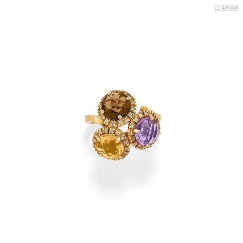 A 18K yellow gold, diamond, amethyst and quartz ring