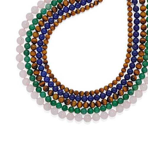 Five 18K yellow gold, lapislazuli, jade and pink quartz neck...