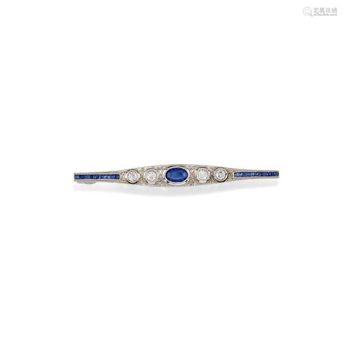 A 18K white gold, diamond and synthetic sapphire brooch