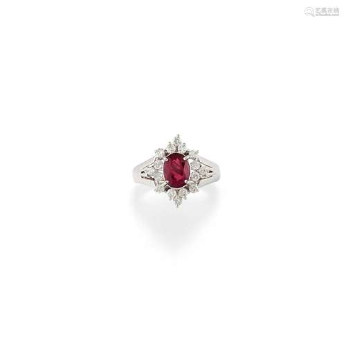 A platinum, ruby and diamond ring