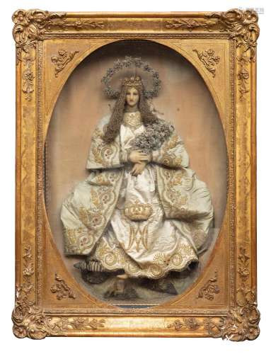 Virgin of dress of the XVIII century. Modeled wax. Cloth ves...