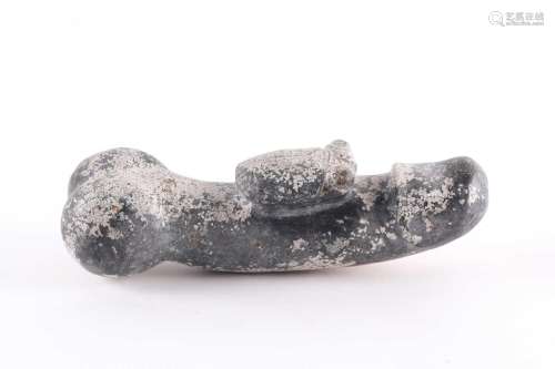 A large Chinese carved variegated grey hardstone erotic stud...