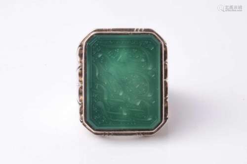 An Eastern white metal gentleman's ring set with a cant...