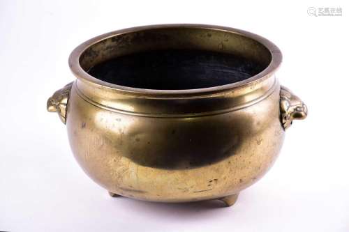 A large Chinese bronze censer, Qing, of circular form with e...