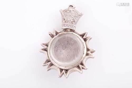 An Indo Persian rock crystal and white metal pendant, with c...