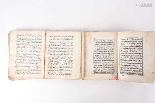 A probably late 19th century Holy Quran with leather-bound s...