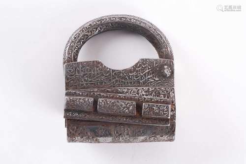 A Persian heavy steel padlock, Qajar Dynasty. Profusely engr...