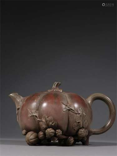 A Chinese Yixing Zisha Pumpkin Shaped Teapot