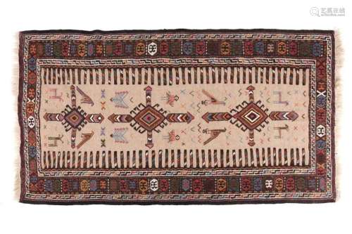 A 20th-century oatmeal ground figural jajim rug with stylize...