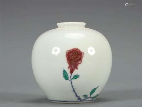 A Chinese Iron-Red Glazed Porcelain Jar with Flower