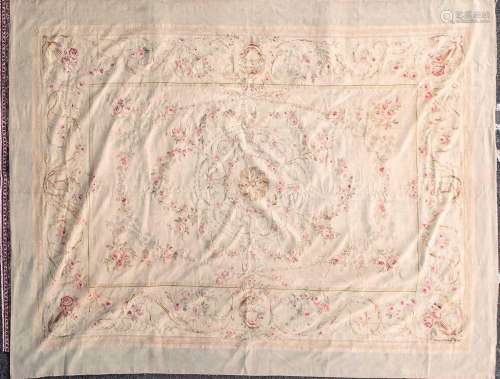 A 20th-century ivory ground Aubusson style tapestry carpet w...