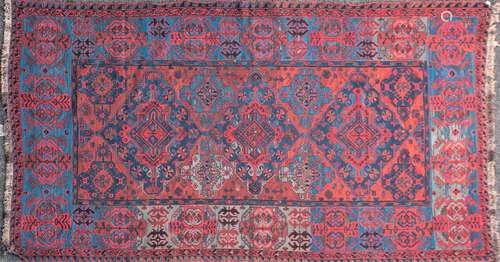 A large 20th-century Caucasian brick red ground Soumak carpe...