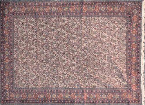 An early 20th century probably Bidjar carpet with ivory grou...