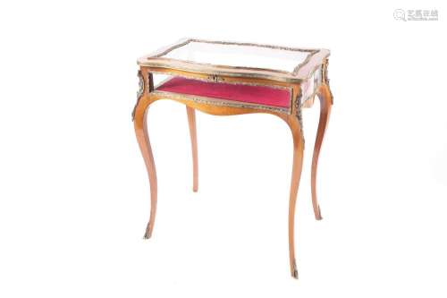 A Louis XV style mahpgany cartouch topped bijouterie table. ...