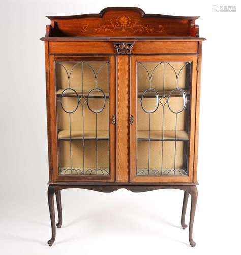 An early 20th century inlaid mahogany display cabinet. With ...