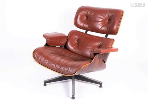 A Charles Eames for Herman Miller lounge armchair, with tan ...