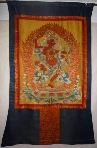 A BROCADE SILK THANGKA OF LAKSMI