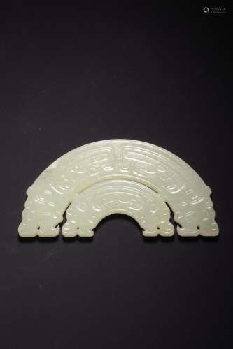 A CARVED JADE 'DRAGON'BI .MING PERIOD