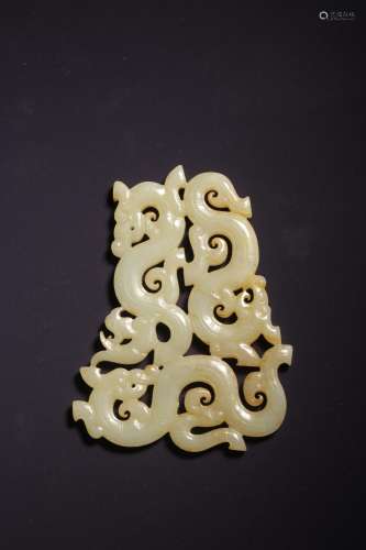 A CARVED JADE 'DRAGON' PENDANT.MING PERIOD