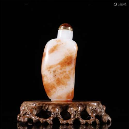 A Chinese Carved Jade Snuff Bottle