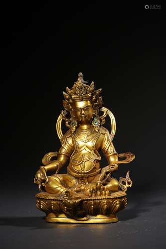 A GILT-BRONZE FIGURE OF PITA-JAMBHALA.QING PERIOD