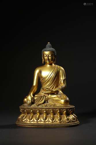 A GILT-BRONZE FIGURE OF BUDDHA.QING PERIOD