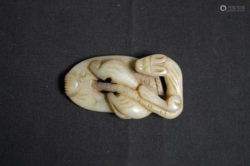 AN ARCHAIC JADE CARVING PIECE