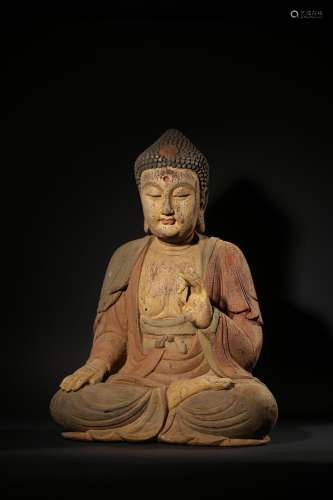 A CARVED WOOD FIGURE OF BUDDHA.SUI PERIOD