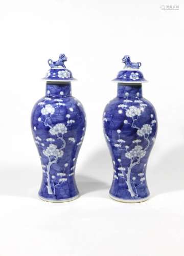 BLUE AND WHITE LIDDED VASE WITH PLUM BLOSSOM, PAIR
