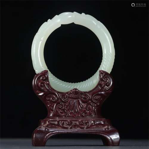 A Chinese Carved Jade Bracelet with Dragon