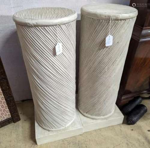 A pair of painted spiral moulded columns, diameter 30cm, hei...