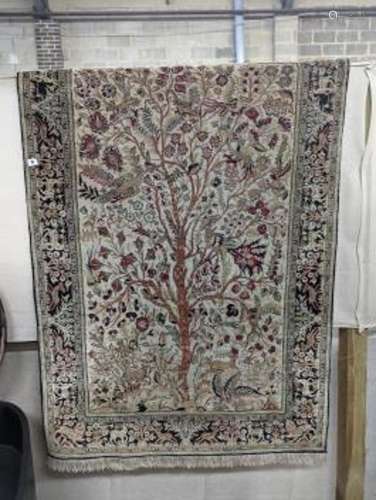 An Ispahan part silk tree of life ivory ground rug, 106 x 15...