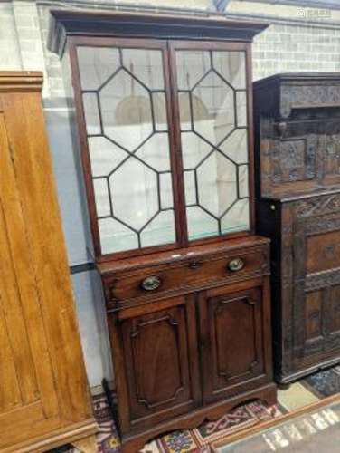 A George III mahogany secretaire bookcase, length 101cm, dep...